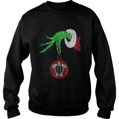 Grinch hand holding turtle ornament sweatshirt