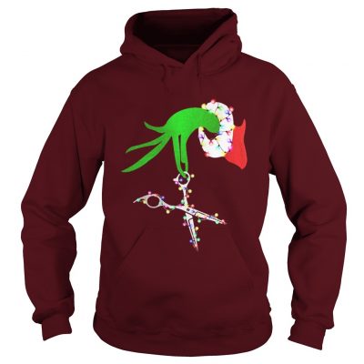 Grinch hand holds scissor hairstylist Christmas Hoodie