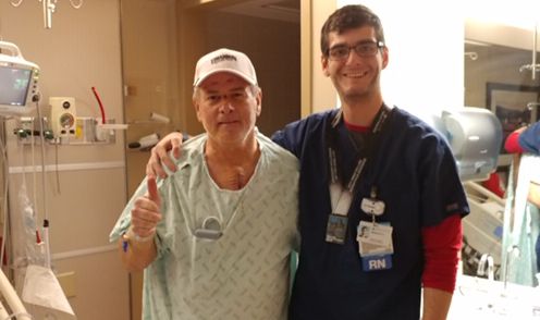 Dwayne Pickens with Brad Hasting, one of the Dallas Marathon runners who stopped running to perform CPR on him last year.