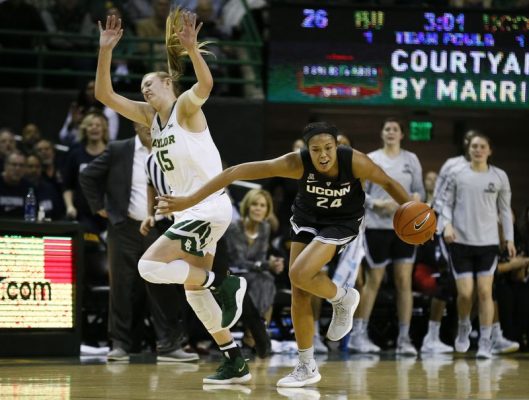 Connecticut forward Napheesa Collier (24) beats Baylor forward Lauren Cox (15) to the loose ball during the first half of an NCAA college basketball game on Thursday, Jan. 3, 2019, in Waco, Texas.