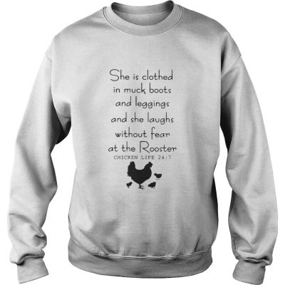 Sweatshirt She is clothed in muck boots and leggings and she laughs without fear shirt