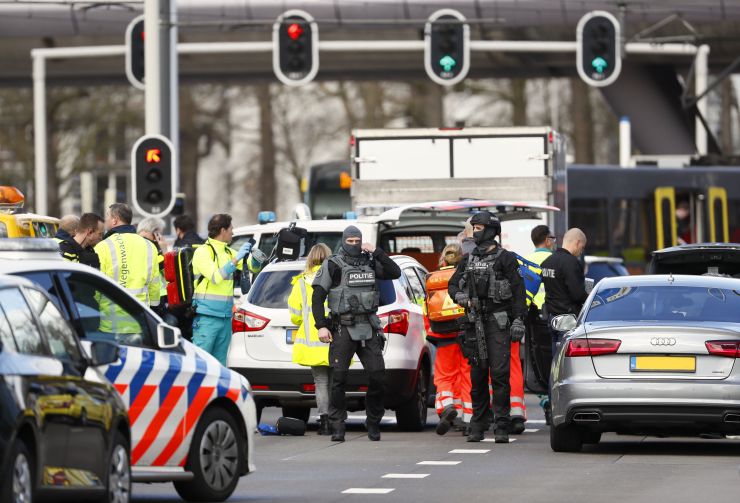 Police forces stand at the 24 Oktoberplace in Utrecht, on March 18, 2019 where a shooting took place.