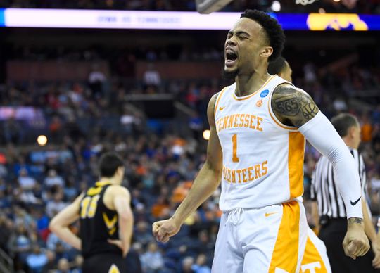 Tennessee guard Lamonte Turner (1) celebrates a foul against Iowa during the first half Sunday