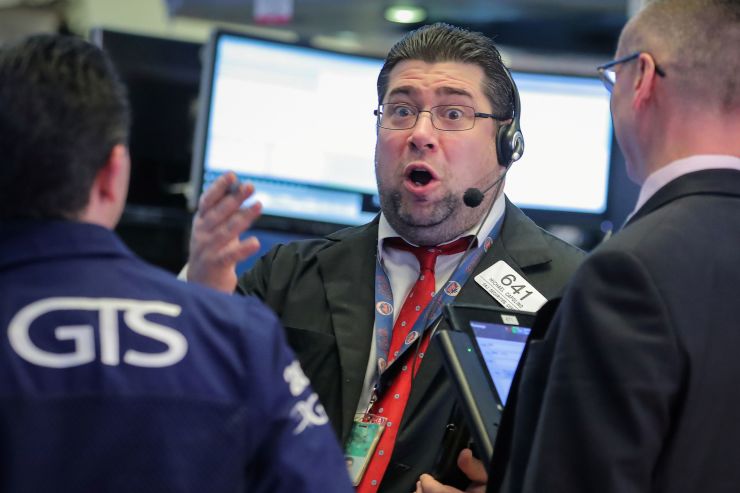 Traders work on the floor of the New York Stock Exchange in New York February 13 2019