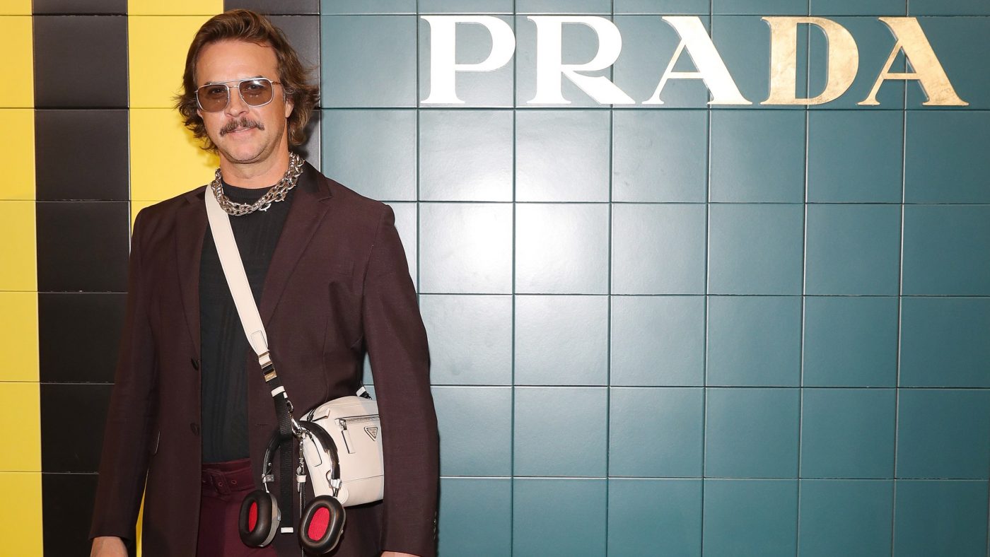 Casey Spooner Takes on the Prada Show in Extremely Short Shorts