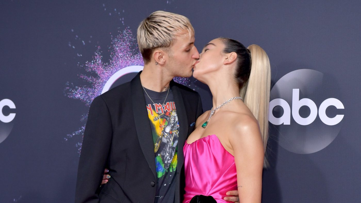 Dua Lipa and Anwar Hadid Seal Couple Style With a Kiss at the AMAs