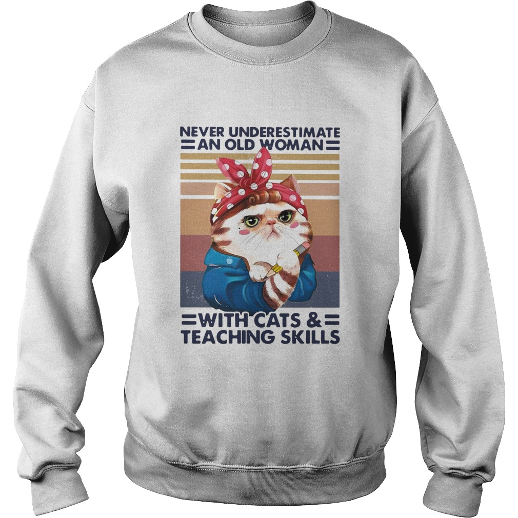 Never Underestimate An Old Woman With Cats And Teaching Skills Vintage Sweatshirt